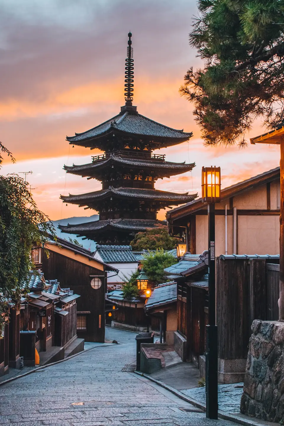 A pagoda overlooks a traditional Kyoto street.